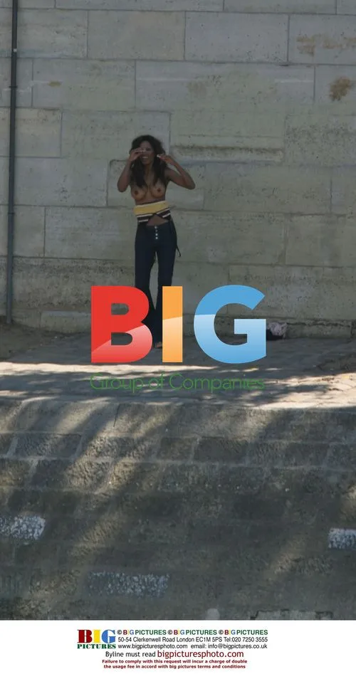 Traci Bingham Strips for PETA Campaign