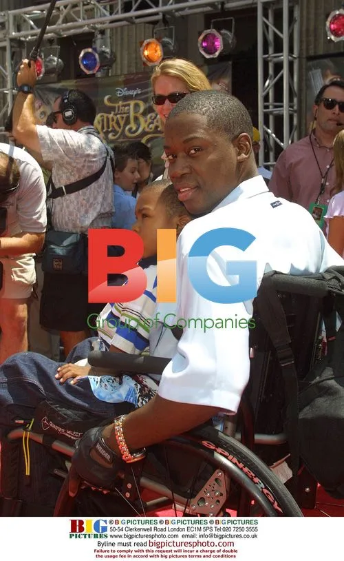 Daryl Mitchell and son at 'Country Bears' premiere