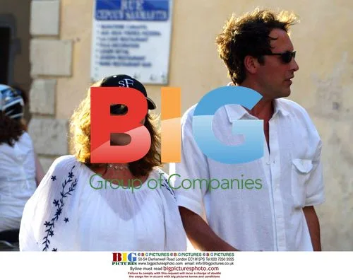 Joan Collins and Husband Percy Strolling in St Tropez