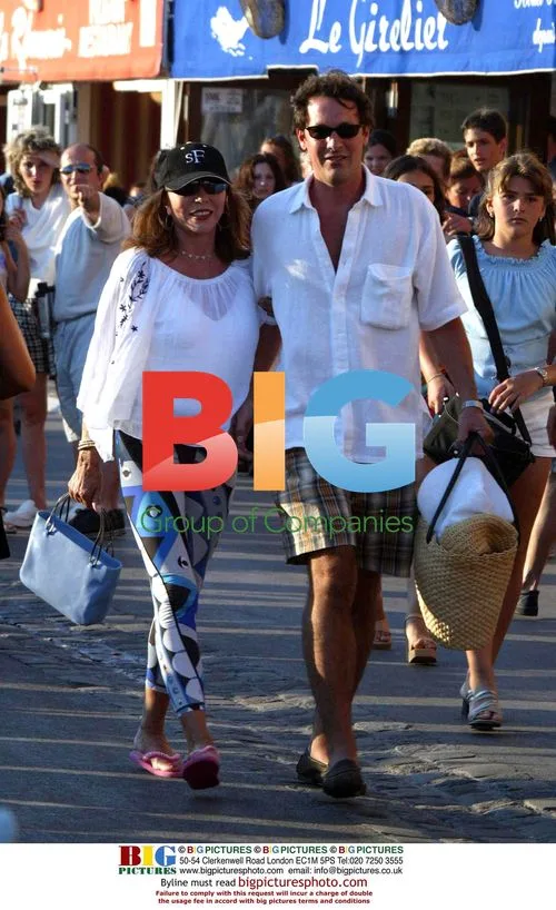 Joan Collins and Husband Strolling in St Tropez