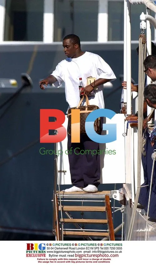 P Diddy Arrives with LV Luggage in St Tropez