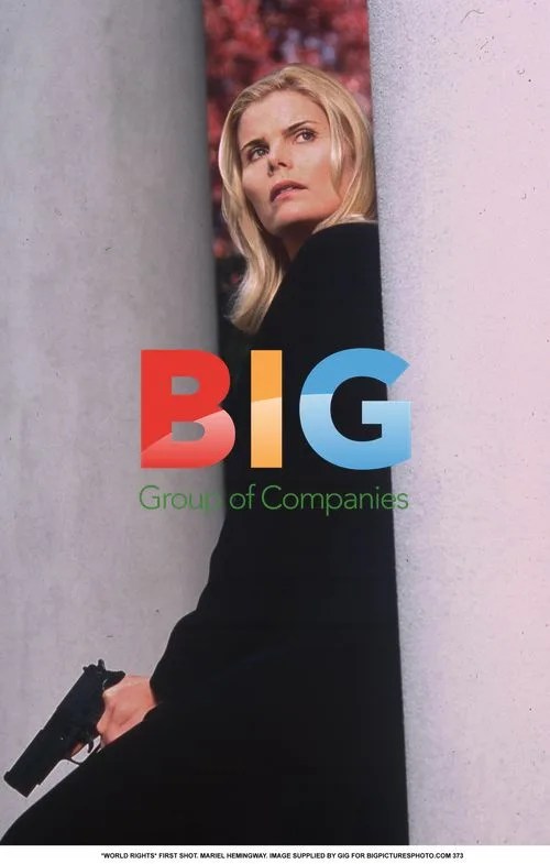 Mariel Hemingway in Black Jacket with Gun
