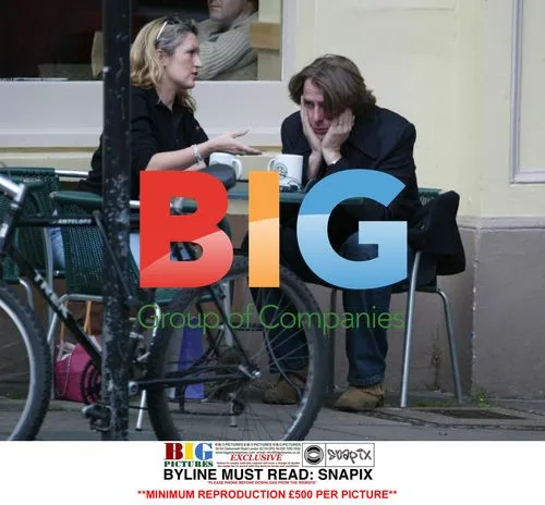 TV Comic Wossy with Friend Outside Cafe