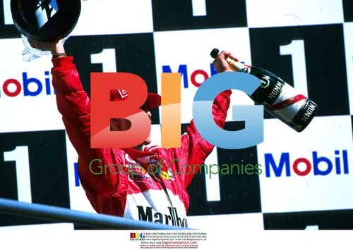 Michael Schumacher Celebrates First Ferrari Win