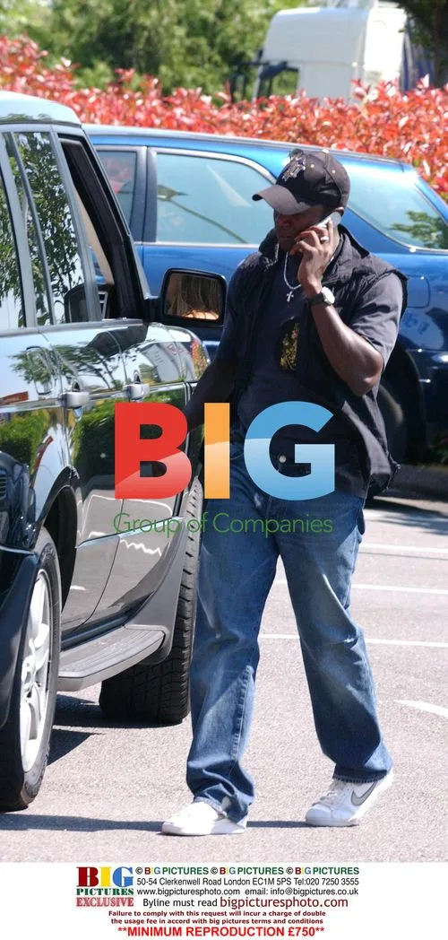 Jordan Spotted with Son and Footballer Dwight Yorke