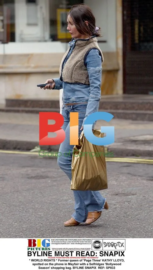 Kathy Lloyd shopping in Mayfair