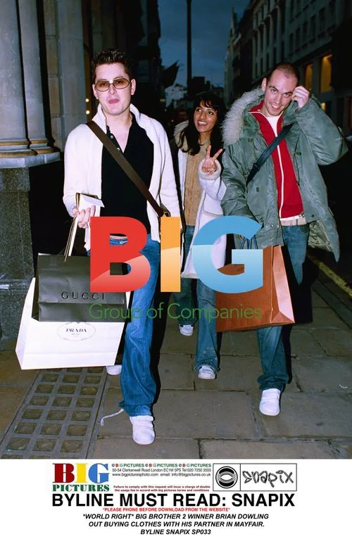 Brian Dowling out shopping with partner in Mayfair