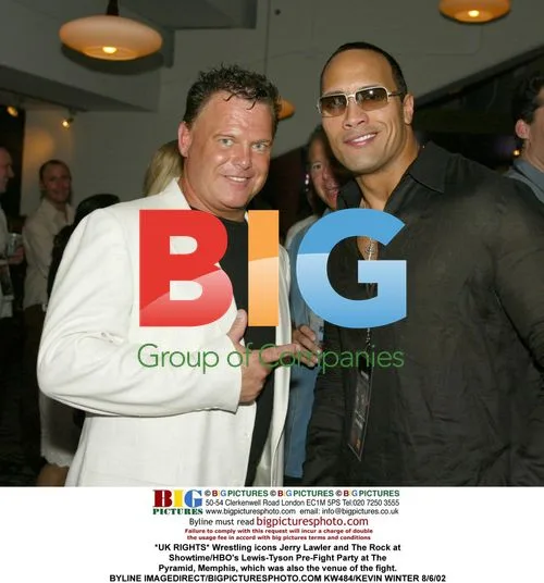 Jerry Lawler and The Rock at Pre-Fight Party