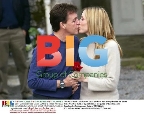 Paul McCartney Kisses Bride Heather Mills