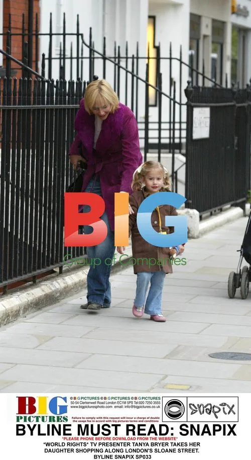 TV presenter Tanya Bryer and daughter shopping in London
