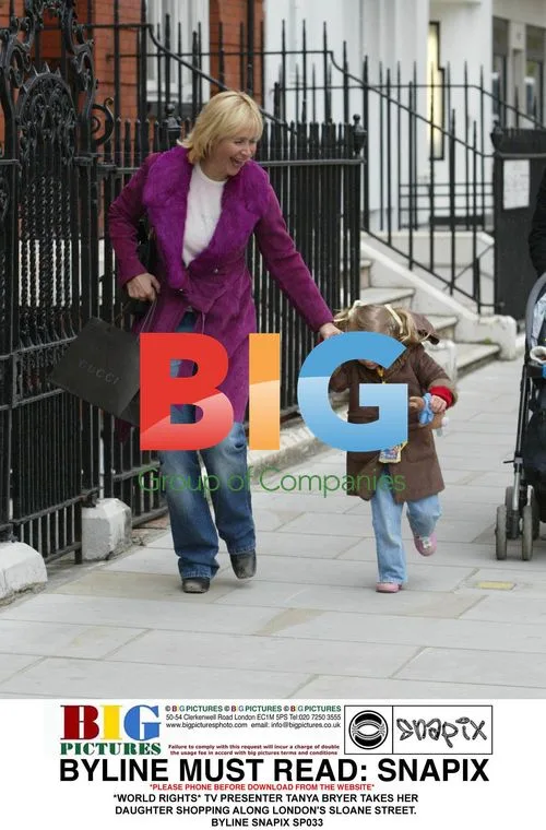 TV Presenter Tanya Bryer and Daughter Shop in London