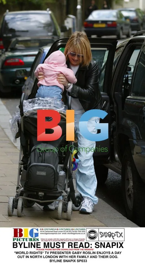 TV Presenter Gaby Roslin Out with Family