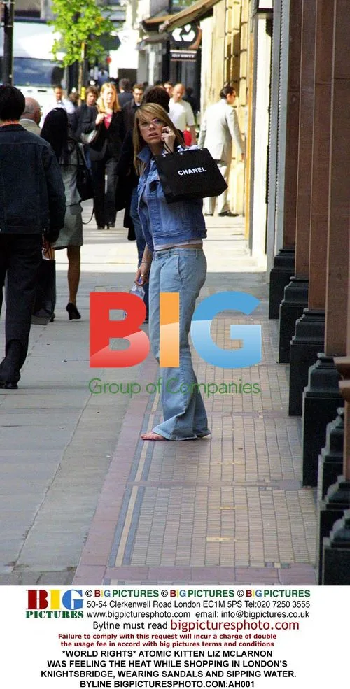 Liz McLarnon of Atomic Kitten Shopping in London