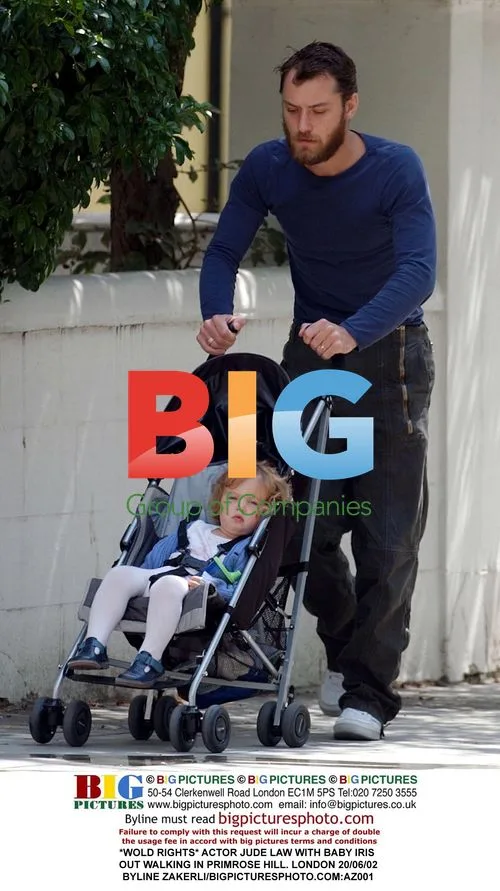 Jude Law strolling with baby Iris in Primrose Hill