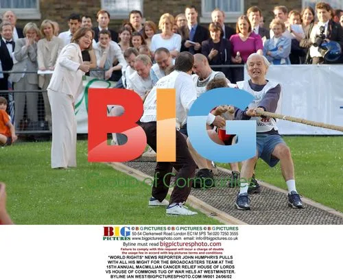 John Humphrys Participates in Tug of War