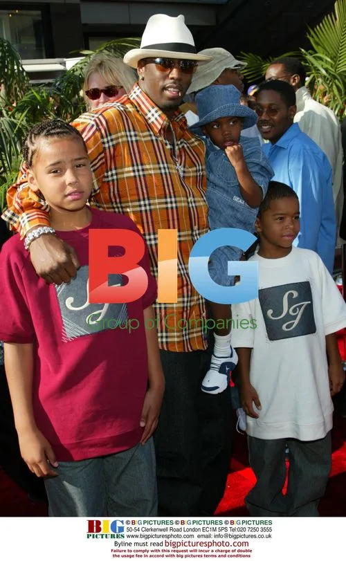 Sean Combs with children at BET Awards