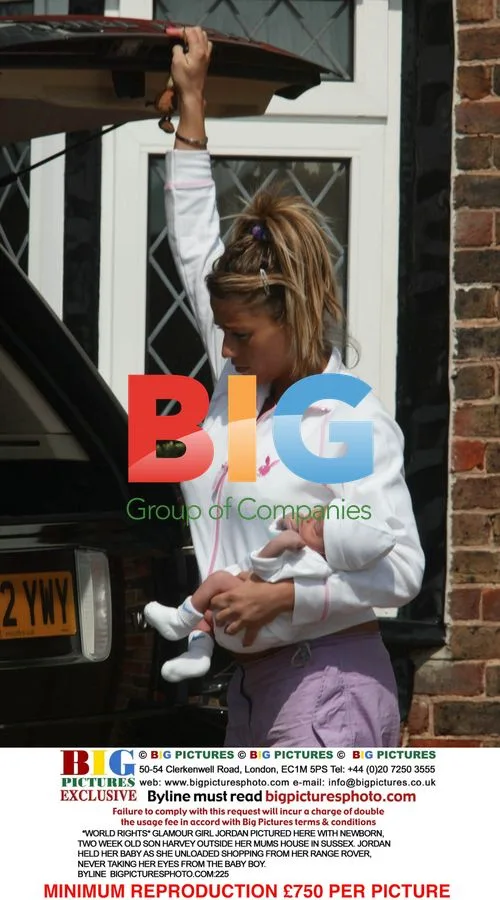 Jordan with newborn son