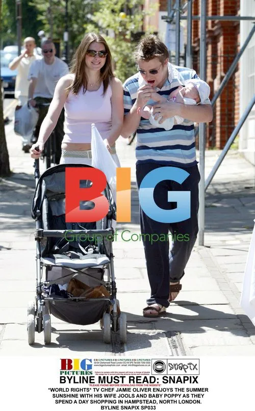 TV Chef Jamie Oliver Out with Family in London