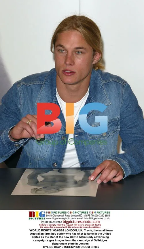Travis, Calvin Klein's new star, signs photos at Selfridges