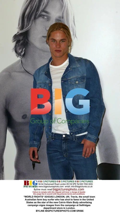 Travis signs Calvin Klein ads in London