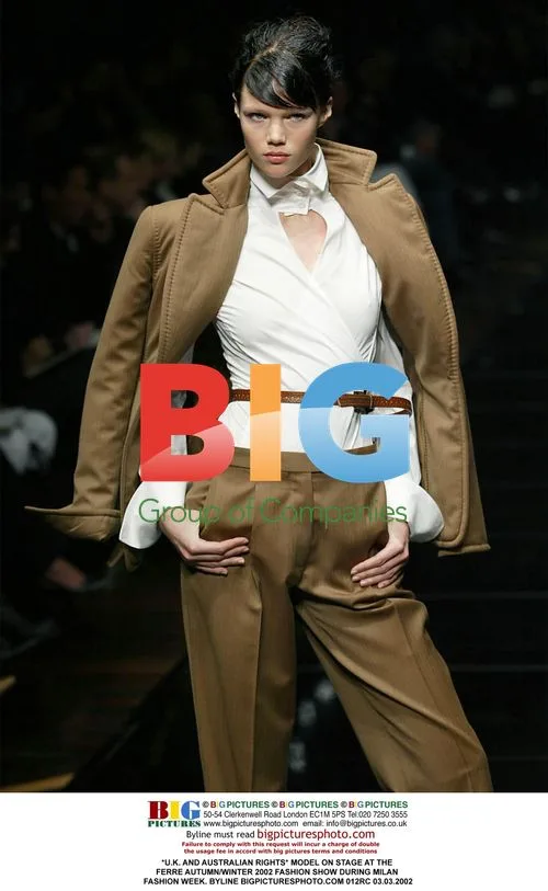 Model on stage at Ferre A/W 2002 fashion show