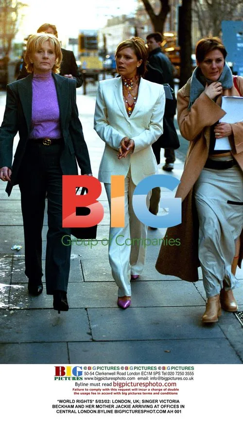 Victoria Beckham and Her Mother Jackie Arriving in London