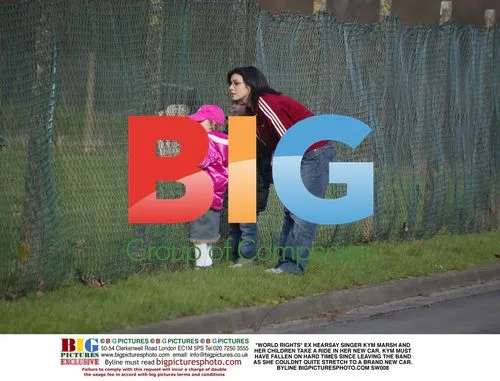 Kym Marsh and children in new car
