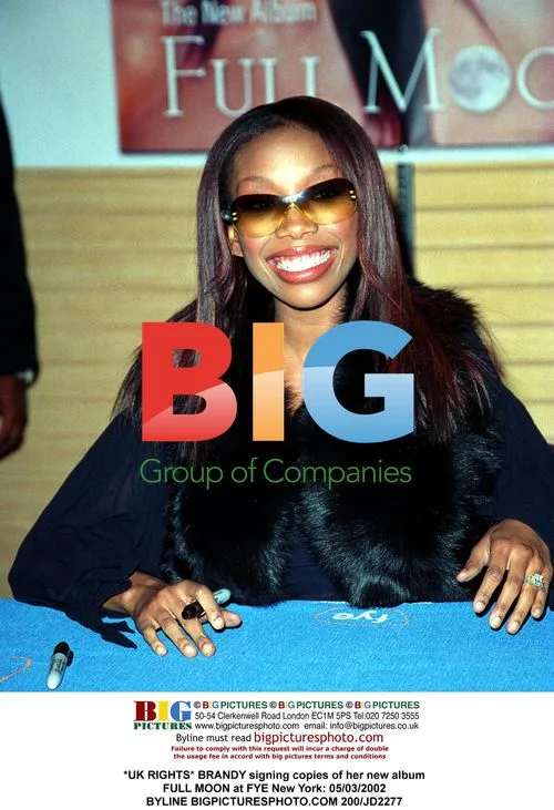 BRANDY signs FULL MOON copies at FYE NYC