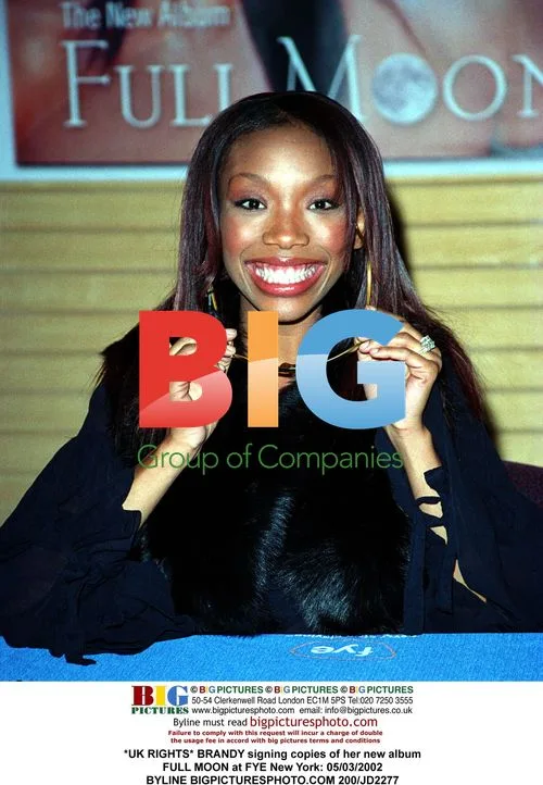 BRANDY signs FULL MOON album at FYE NYC
