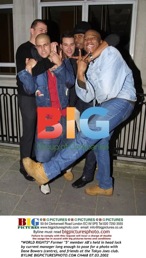 AB held in headlock at Tokyo Joes club