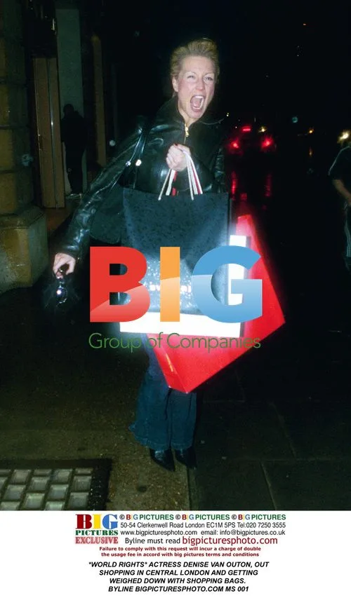Denise Van Outen Overburdened with Bags in London