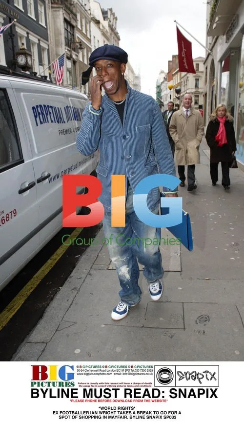 Ian Wright Shopping in Mayfair