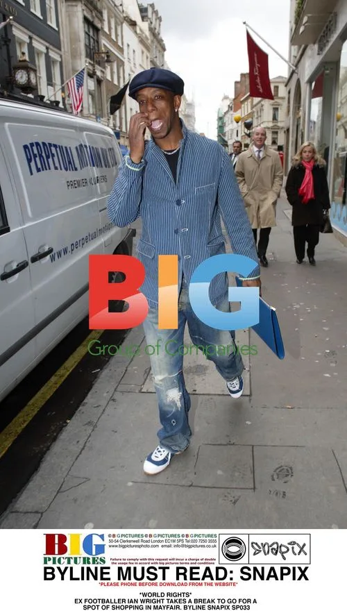 Ex Footballer Ian Wright Shopping in Mayfair