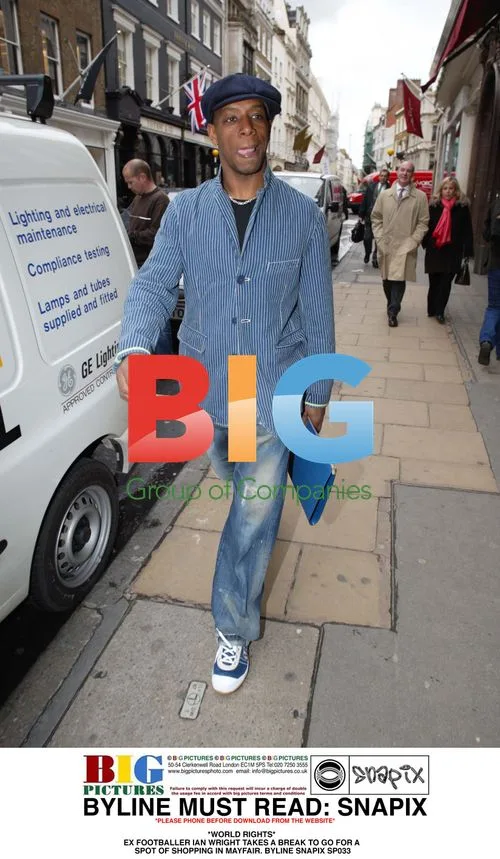 Ian Wright Shopping in Mayfair
