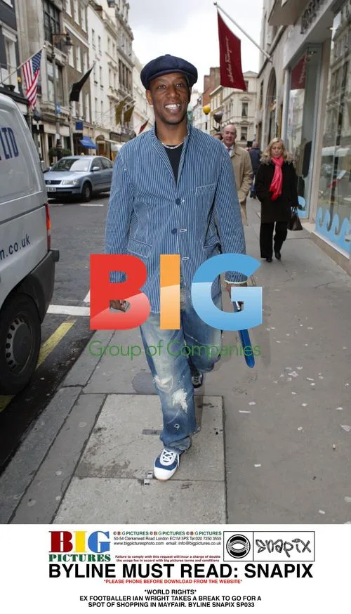 Ian Wright Shopping in Mayfair