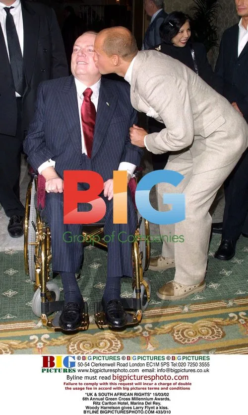 Woody Harrelson Kisses Larry Flynt