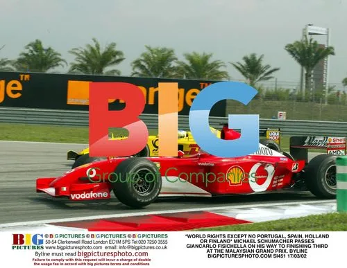 Schumacher Passes Fisichella at Malaysian GP