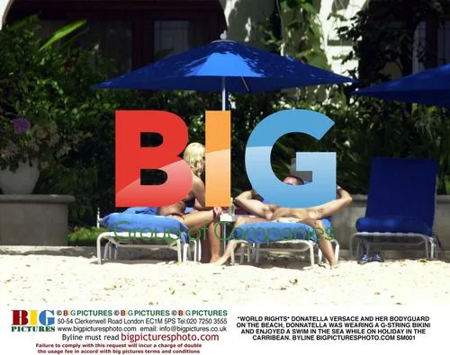 Donatella Versace and Bodyguard on Beach
