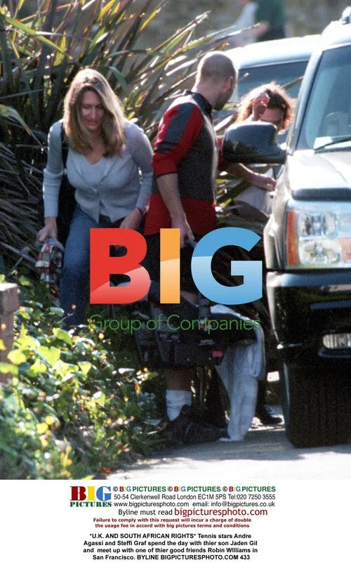 Andre Agassi and Steffi Graf with son and Robin Williams