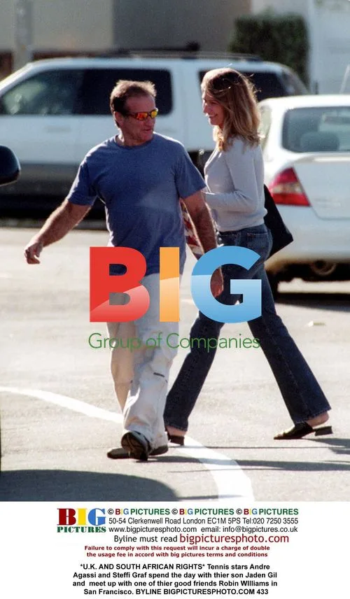 Andre Agassi and Steffi Graf with son and Robin Williams
