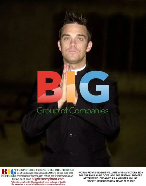 Robbie Williams Ordained as Minister