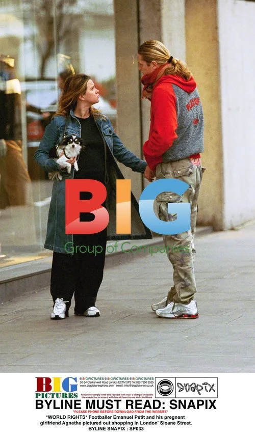 Footballer Emanuel Petit and pregnant girlfriend out shopping