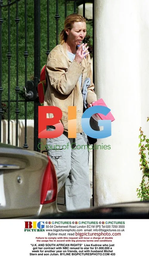 Lisa Kudrow out with family