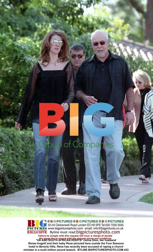 Celine Dion and family outside hotel