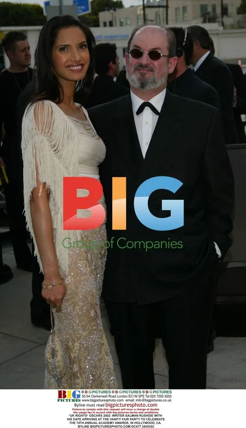 Salman Rushdie and date at Vanity Fair Oscars party