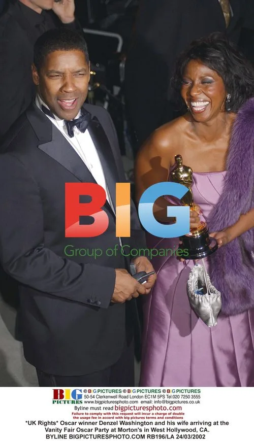 Denzel Washington and wife at Vanity Fair Oscar Party