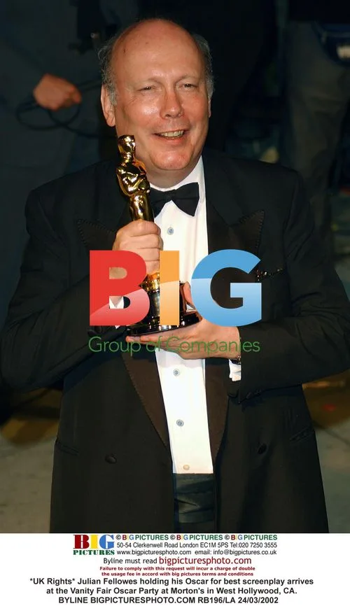 Julian Fellowes Arrives at Vanity Fair Oscar Party