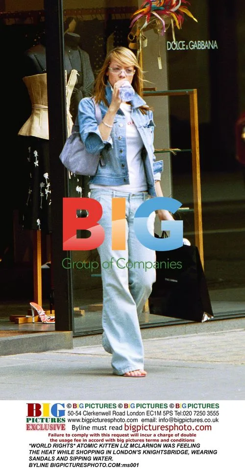 Liz McLarnon of Atomic Kitten Shopping in London
