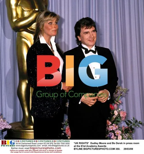 Dudley Moore and Bo Derek at 61st Oscars