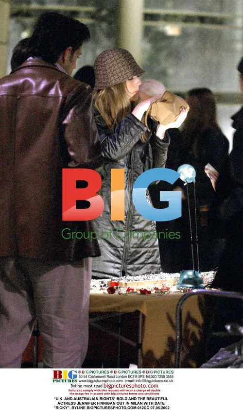 Jennifer Finnigan out in Milan with date "Ricky"